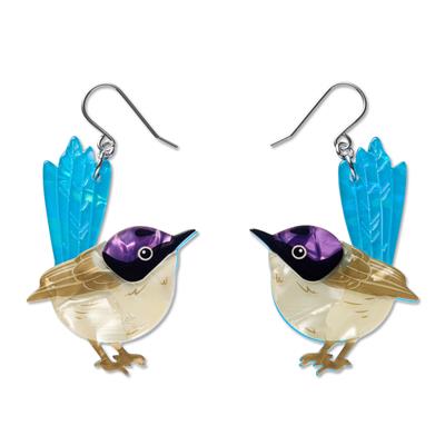 Bird-shaped earrings with blue and purple accents on a white background
