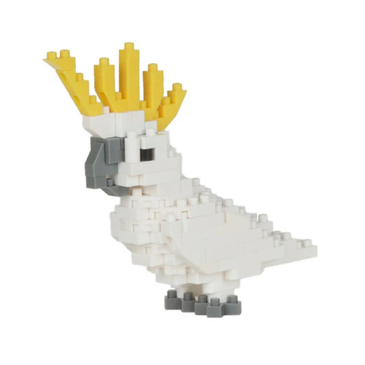 A small sulfur crested cockatoo  bird-shaped building block toy made of white, yellow, gray, and black pieces, shown on a plain white background.