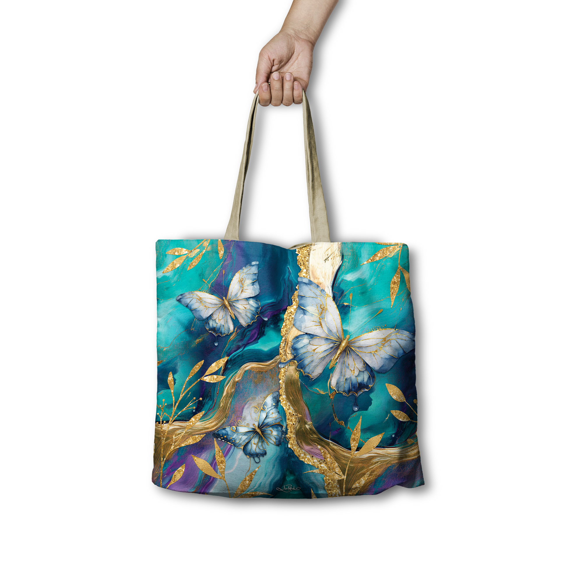 Tote bag with butterfly design held by a hand on a white background